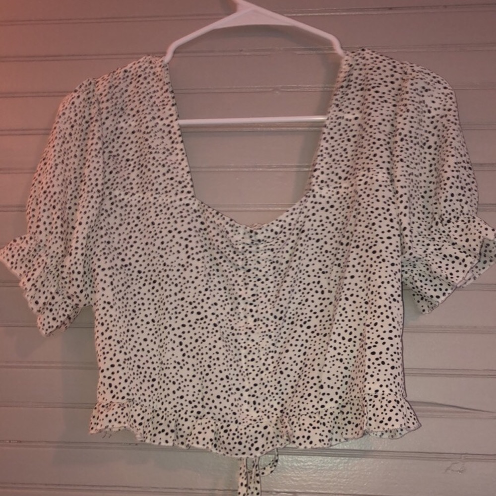 spotted black and white shirt
